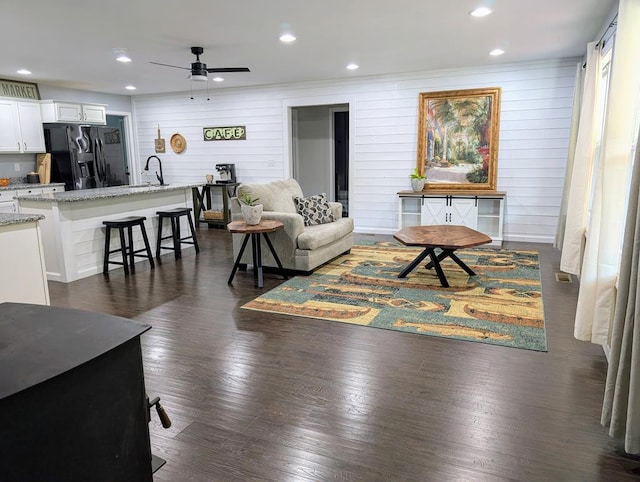 3569 Dry Mill Creek Rd, Hilham, TN 38568 - living room with ceiling fan, dark wood finished floors, recessed lighting, and wooden walls