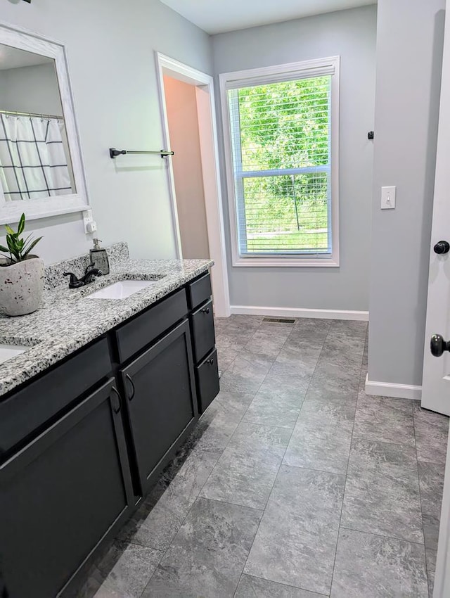 3569 Dry Mill Creek Rd, Hilham, TN 38568 - full bath with double vanity and baseboards
