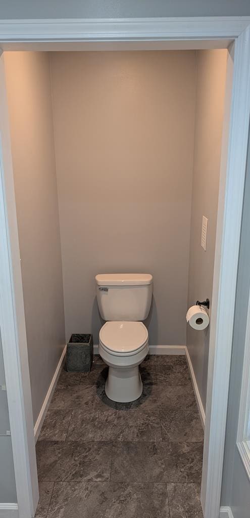 3569 Dry Mill Creek Rd, Hilham, TN 38568 - bathroom with toilet and baseboards