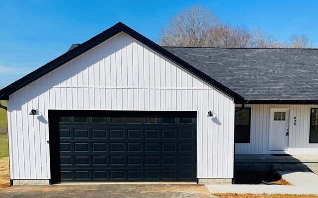 garage featuring driveway