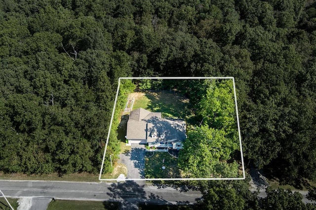 drone / aerial view with a forest view