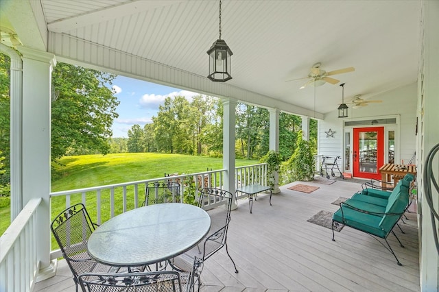 292 Mclerran Cemetery Rd, Moss, TN 38575 - wooden deck featuring ceiling fan, a yard, and view of scattered trees
