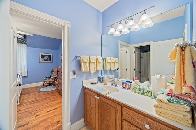 292 Mclerran Cemetery Rd, Moss, TN 38575 - bathroom featuring vanity, wood finished floors, and a shower with door