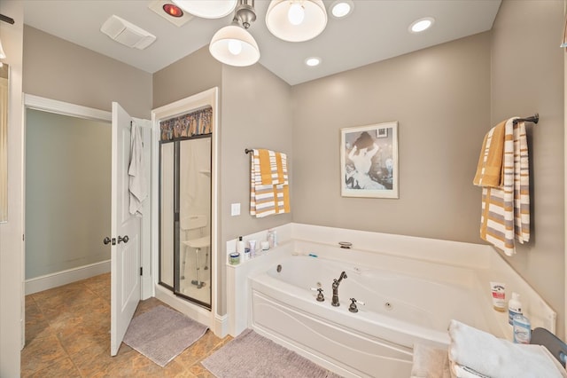 292 Mclerran Cemetery Rd, Moss, TN 38575 - bathroom with a jetted tub and a stall shower