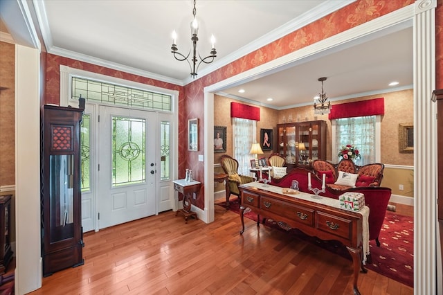 292 Mclerran Cemetery Rd, Moss, TN 38575 - entryway with a chandelier, wallpapered walls, hardwood / wood-style flooring, healthy amount of natural light, and crown molding