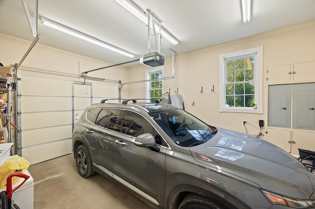 292 Mclerran Cemetery Rd, Moss, TN 38575 - garage featuring a garage door opener and electric panel