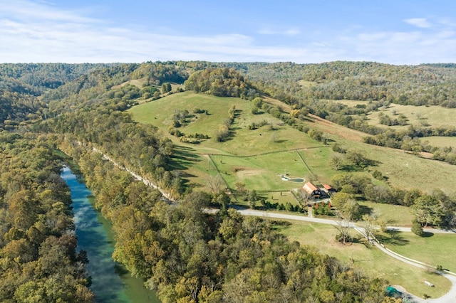 aerial view featuring a rural view and a water view