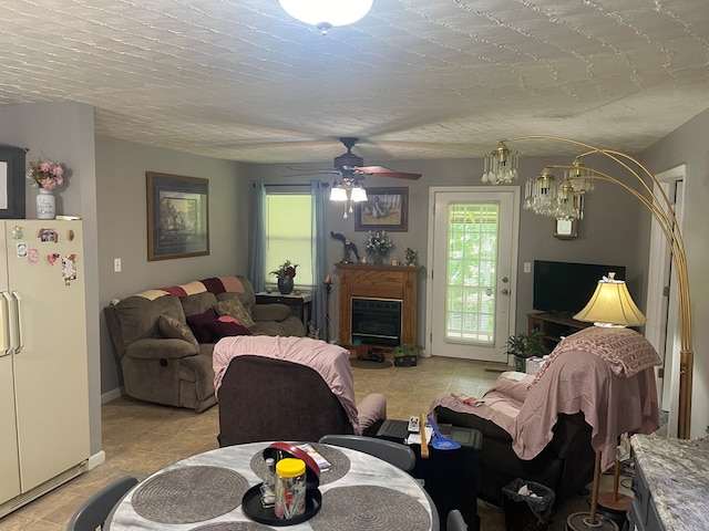 239 Doc Huling Rd, Robbins, TN 37852 - living room with plenty of natural light, a ceiling fan, and light tile patterned floors