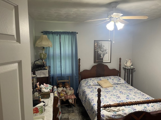 239 Doc Huling Rd, Robbins, TN 37852 - bedroom with stone finish flooring and a ceiling fan