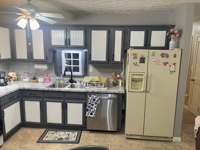 239 Doc Huling Rd, Robbins, TN 37852 - kitchen featuring white refrigerator with ice dispenser, dishwasher, a ceiling fan, and light tile patterned floors