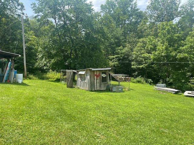 239 Doc Huling Rd, Robbins, TN 37852 - view of grassy yard featuring an outdoor structure and exterior structure