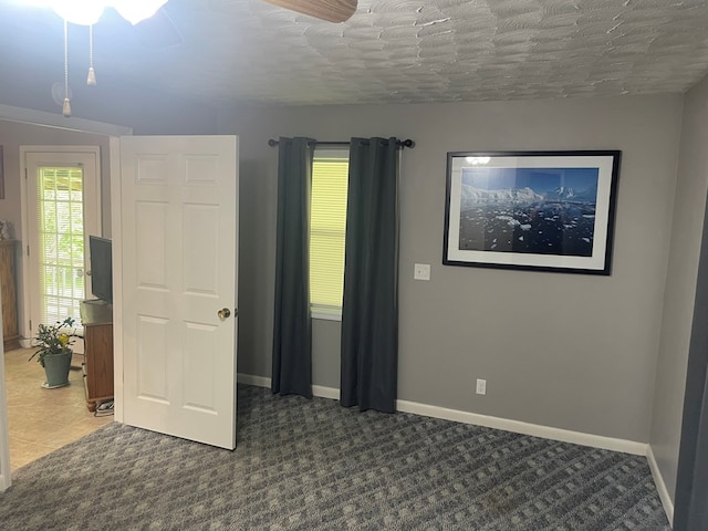 239 Doc Huling Rd, Robbins, TN 37852 - spare room featuring baseboards and a textured ceiling