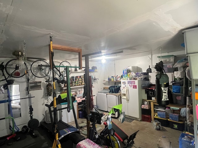 239 Doc Huling Rd, Robbins, TN 37852 - garage with washer and dryer and white fridge with ice dispenser