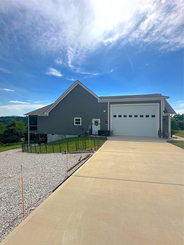 197 Sunfish Ln, Hilham, TN 38568 - view of front of home with driveway and an attached garage