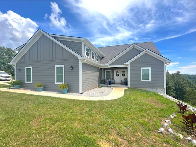 197 Sunfish Ln, Hilham, TN 38568 - rear view of property featuring board and batten siding, a yard, and covered porch