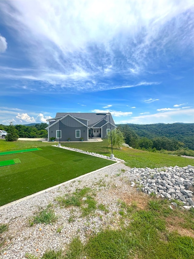 197 Sunfish Ln, Hilham, TN 38568 - rear view of property with glass enclosure and a yard