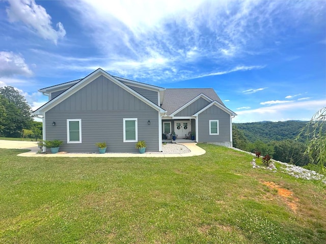 197 Sunfish Ln, Hilham, TN 38568 - back of house with board and batten siding and a lawn