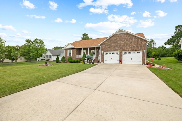 169 Prosperity Dr, Baxter, TN 38544 - view of front of property with brick siding, a front lawn, driveway, and an attached garage
