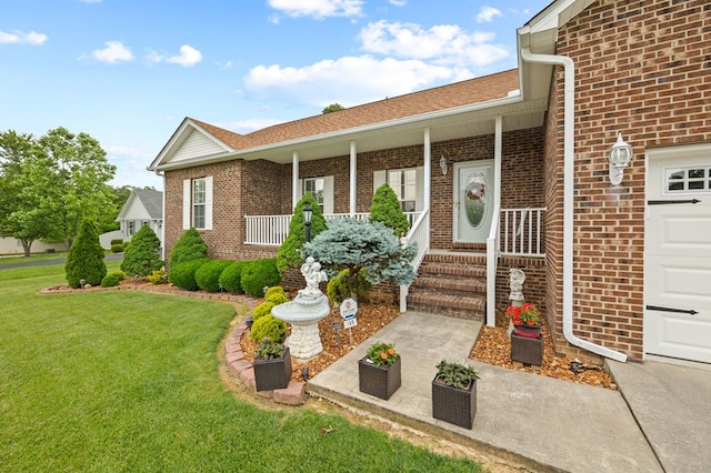 169 Prosperity Dr, Baxter, TN 38544 - entrance to property with brick siding, a lawn, and a porch