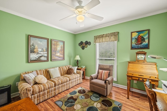 169 Prosperity Dr, Baxter, TN 38544 - living area with ornamental molding, ceiling fan, wood finished floors, and baseboards