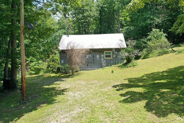 190 Roughshod Ln, Hilham, TN 38568 - view of outdoor structure featuring a forest view