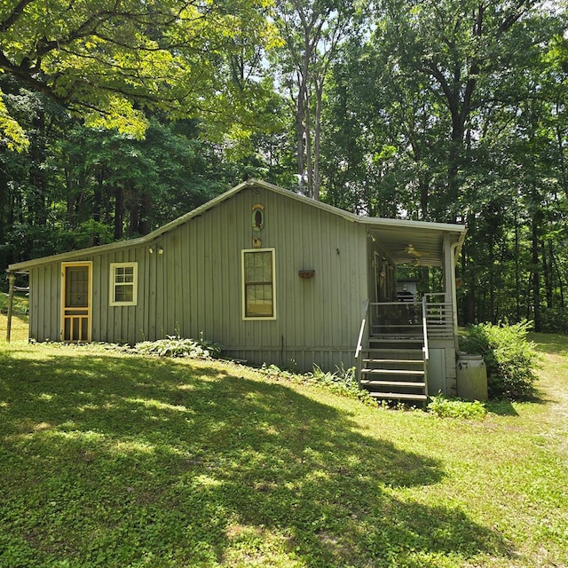 190 Roughshod Ln, Hilham, TN 38568 - view of outbuilding featuring stairs and covered porch