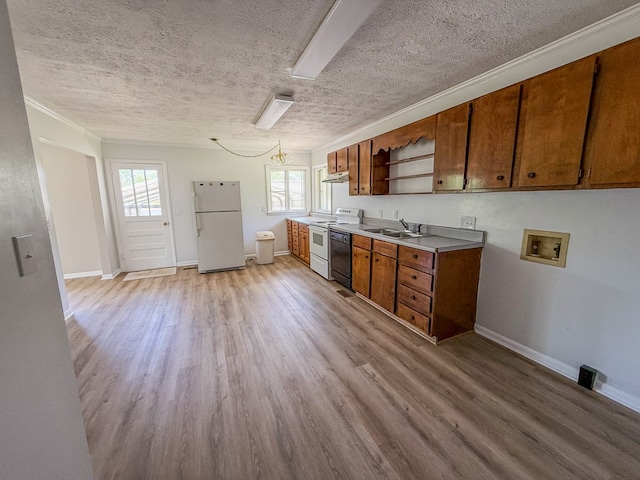 540 4th Ave, Baxter, TN 38544 - kitchen with white appliances, open shelves, brown cabinets, light wood-style floors, and healthy amount of natural light