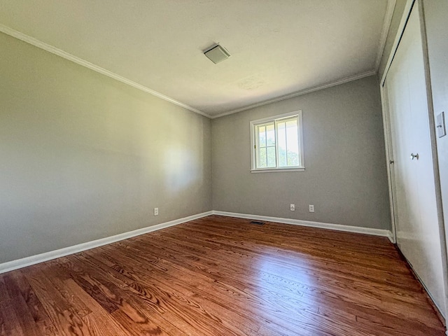 540 4th Ave, Baxter, TN 38544 - empty room featuring ornamental molding and dark wood finished floors