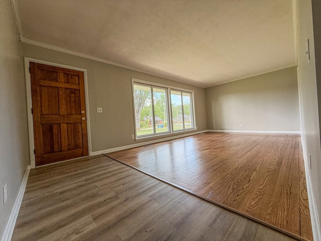 540 4th Ave, Baxter, TN 38544 - spare room with crown molding and wood finished floors