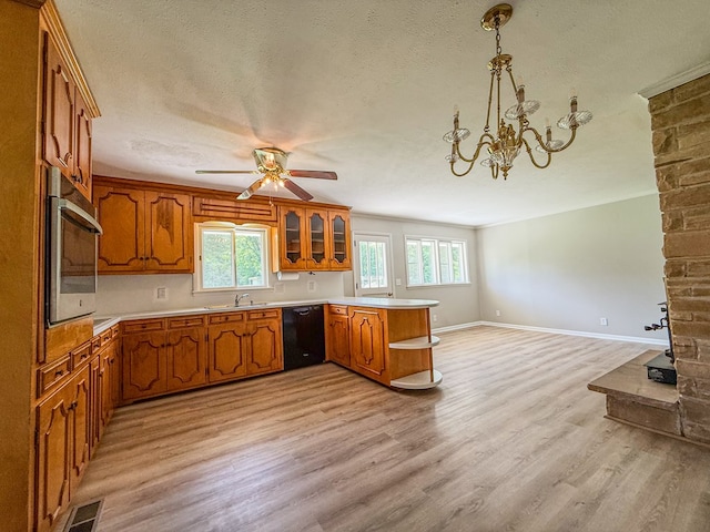 540 4th Ave, Baxter, TN 38544 - kitchen with dishwasher, a peninsula, brown cabinets, light wood-style flooring, and wall oven