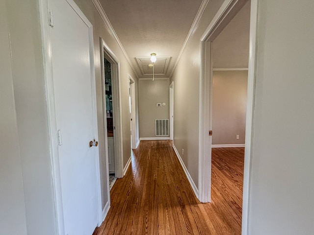 540 4th Ave, Baxter, TN 38544 - corridor with attic access, wood finished floors, and ornamental molding