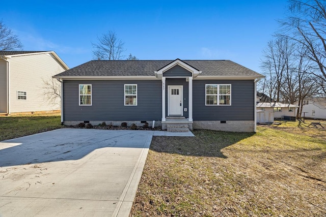 bungalow with a shingled roof, crawl space, and a front yard