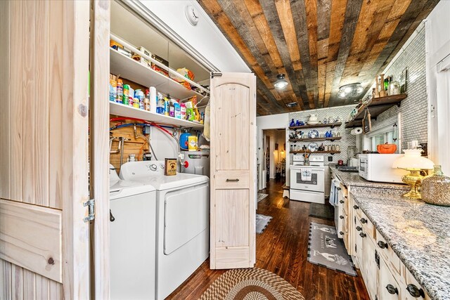 washroom with wood ceiling, washer and dryer, laundry area, and dark wood-style flooring