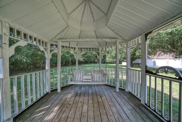 exterior space featuring vaulted ceiling