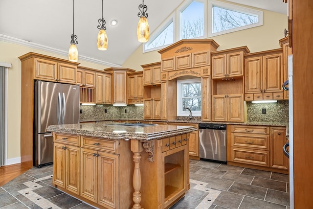 kitchen featuring stone countertops, a kitchen island, appliances with stainless steel finishes, open shelves, and decorative light fixtures