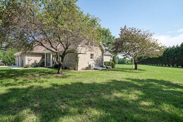 view of yard with an attached garage