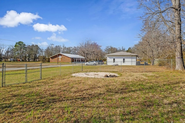 view of yard with a rural view and fence