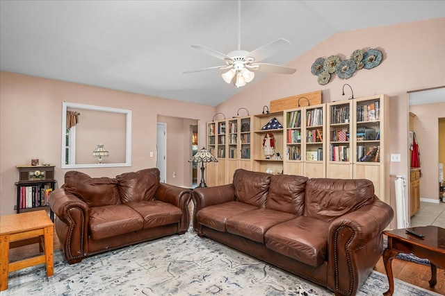 living room featuring lofted ceiling and ceiling fan