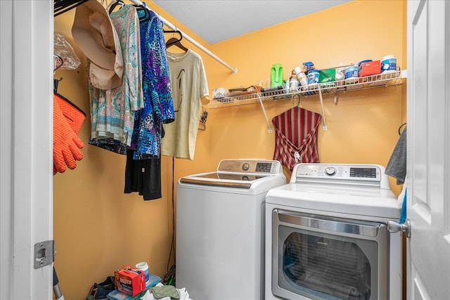 laundry room with laundry area and washer and dryer