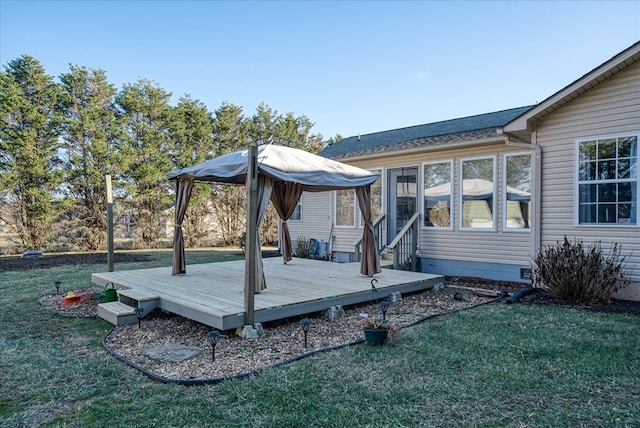 wooden deck with a lawn