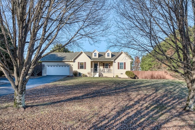 cape cod-style house with aphalt driveway, an attached garage, crawl space, fence, and a porch