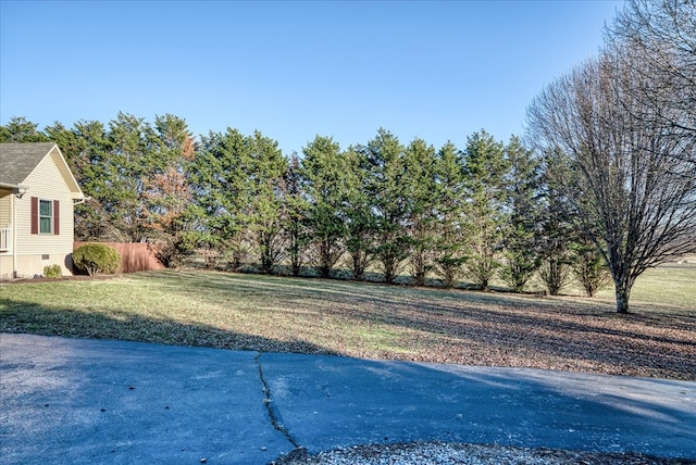 view of yard with fence