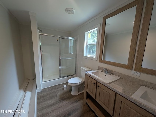 216 Valerie Dr, Deer Lodge, TN 37726 - bathroom featuring an enclosed shower, wood finished floors, double vanity, and ornamental molding