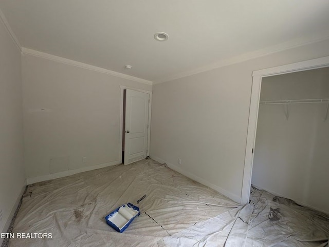 216 Valerie Dr, Deer Lodge, TN 37726 - unfurnished bedroom featuring ornamental molding and a closet