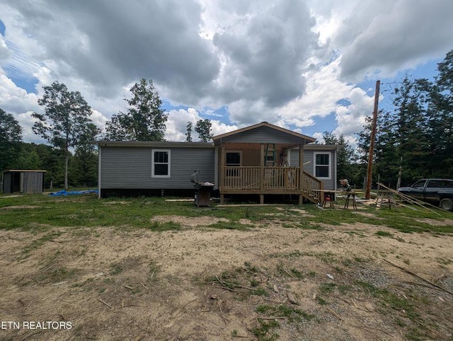 216 Valerie Dr, Deer Lodge, TN 37726 - rear view of property featuring a porch