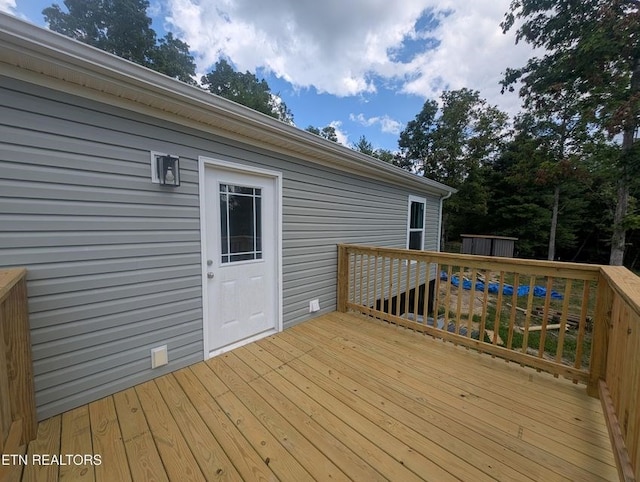 216 Valerie Dr, Deer Lodge, TN 37726 - deck featuring a storage unit