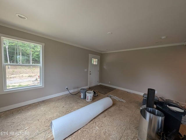 216 Valerie Dr, Deer Lodge, TN 37726 - unfurnished living room featuring crown molding