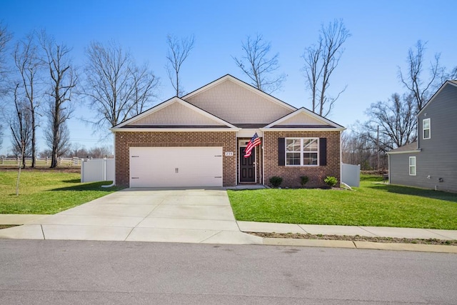 view of front facade with an attached garage, a front lawn, concrete driveway, and brick siding