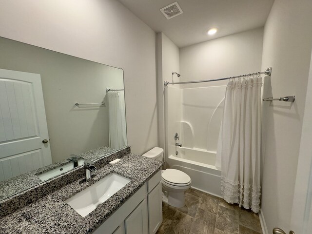 336 Oliver Way, Baxter, TN 38544 - full bath with toilet, vanity, shower / bath combination with curtain, and stone finish floors