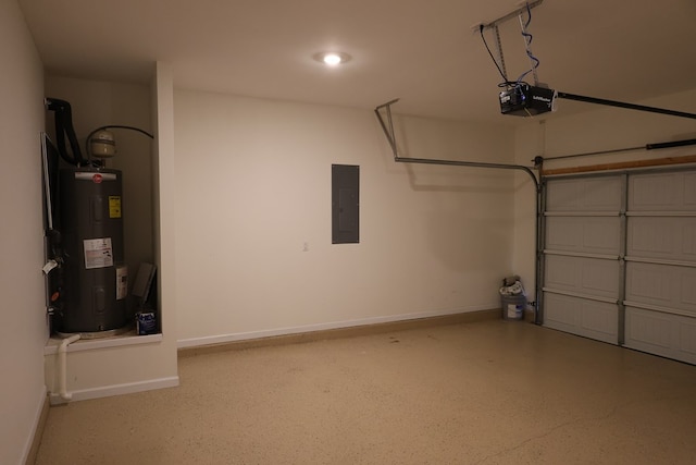 336 Oliver Way, Baxter, TN 38544 - garage with electric water heater, electric panel, a garage door opener, and baseboards